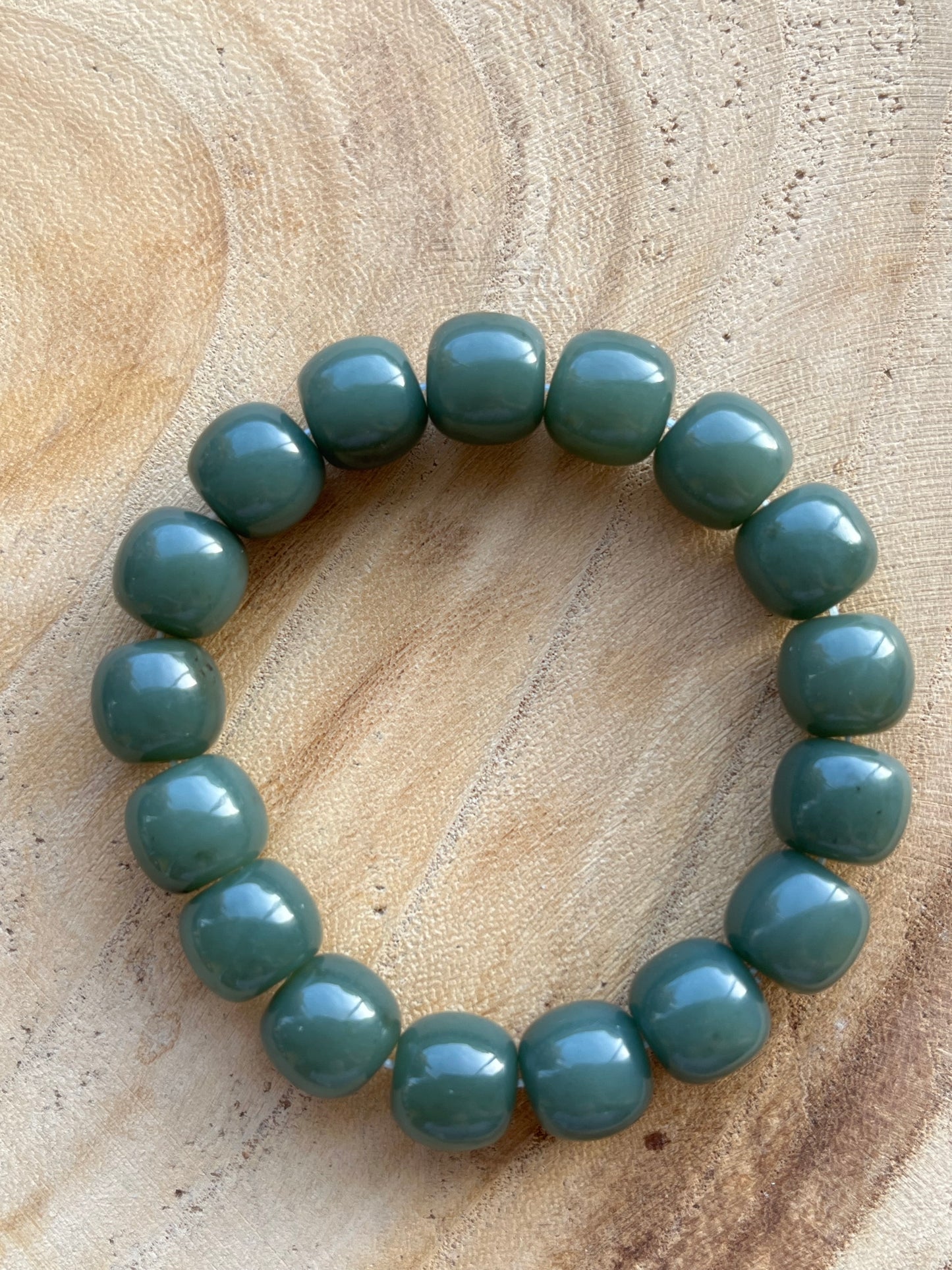 Blue Hetian Jade Bracelet with 12mm x 10mm Barrel Bead
