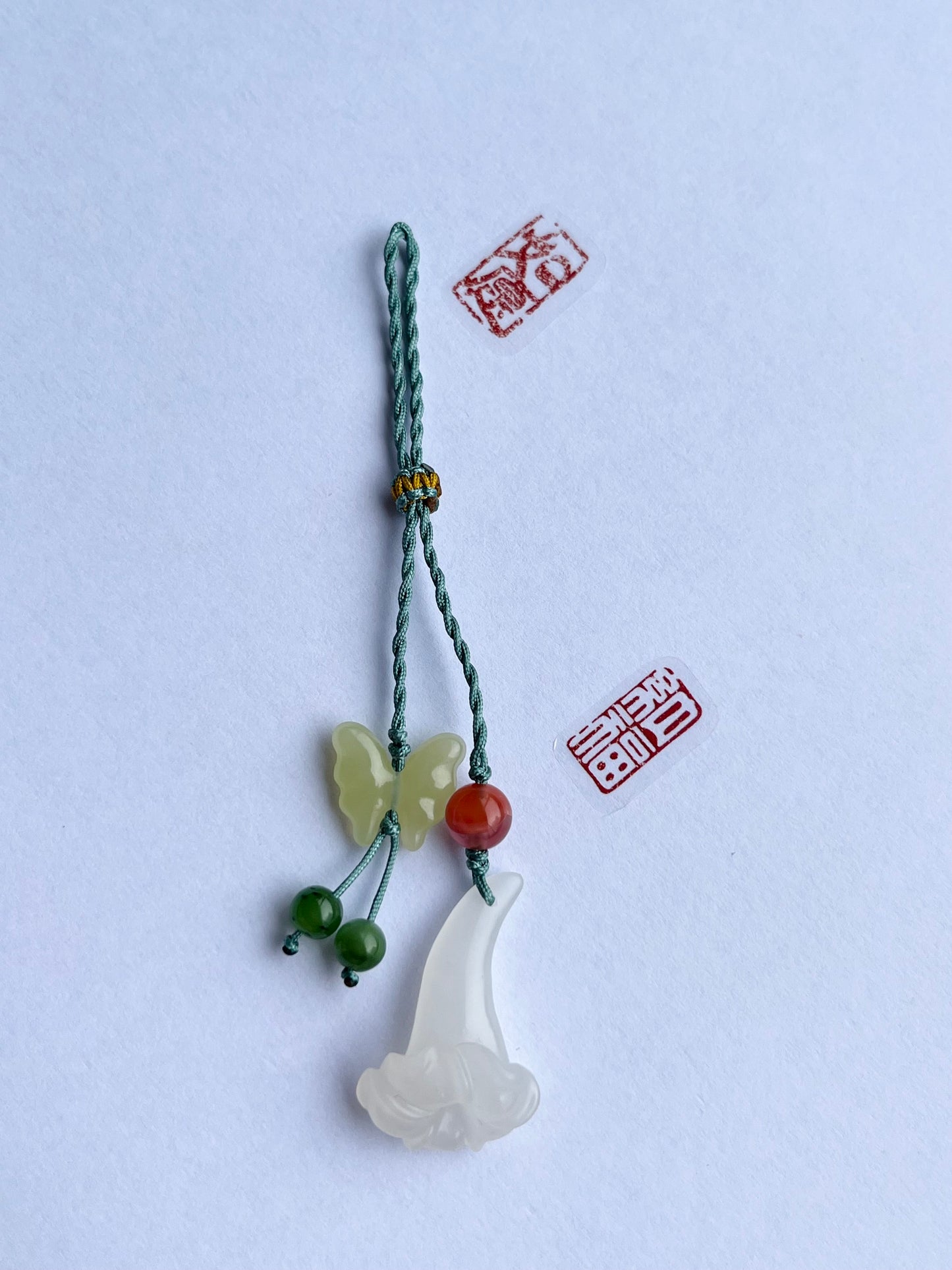 Handmade Phone Charm with a Hand Carved Hetian Jade Trumpet Flower and Butterfly