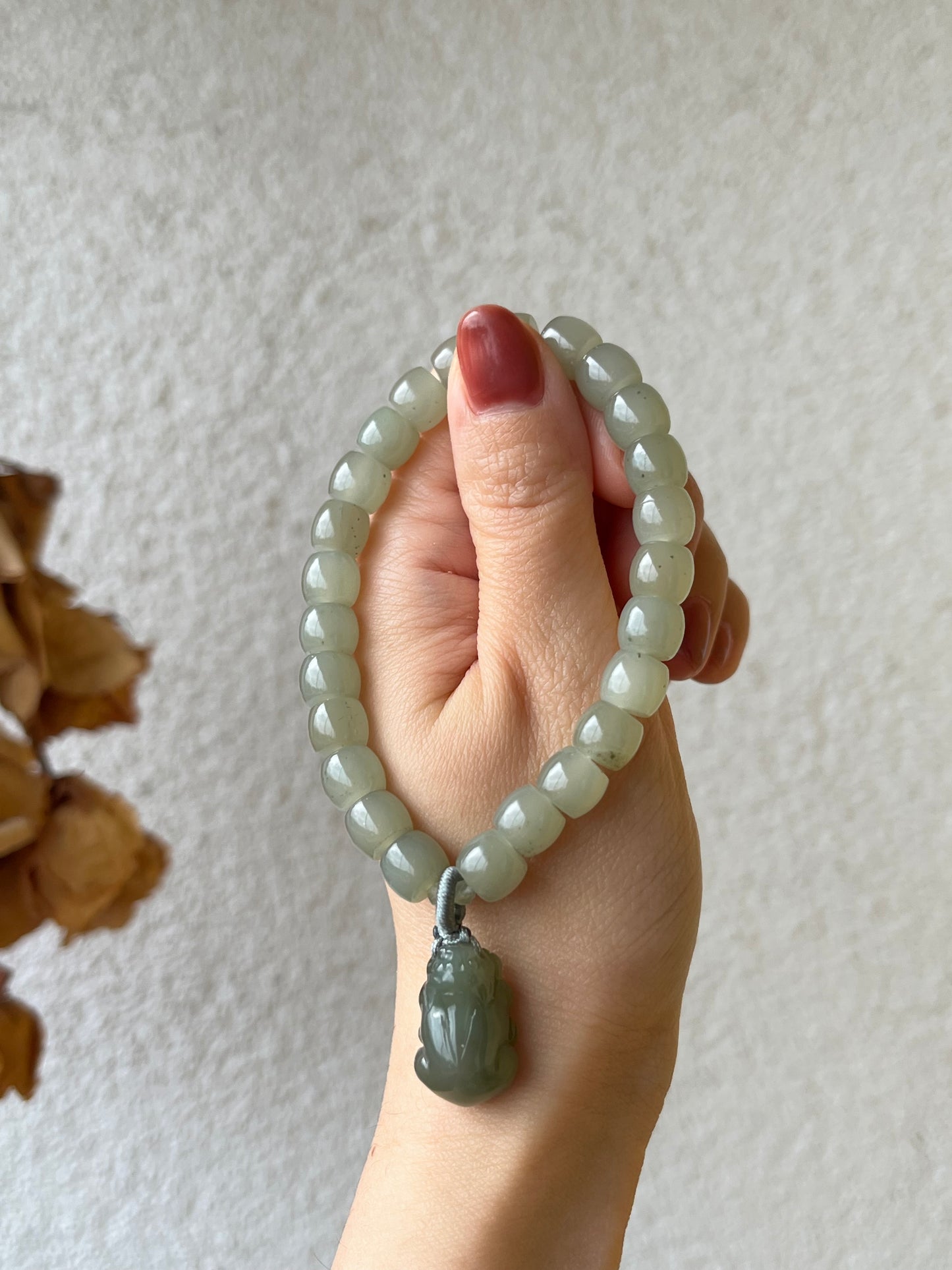 Straight Cut Hetian Jade Beaded (7mm x 8mm) Bracelet with a Hetian Jade Pixiu Pendant
