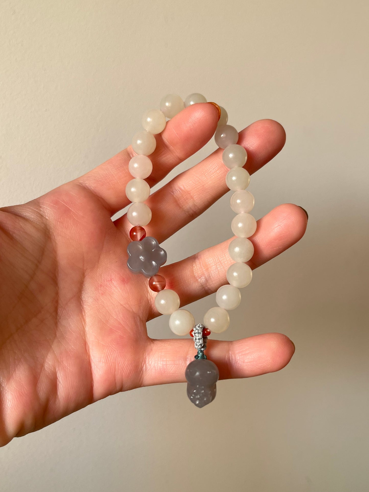 White Hetian Jade Bracelet with 8mm Bead and a Hand Carved Purple Jade Cat