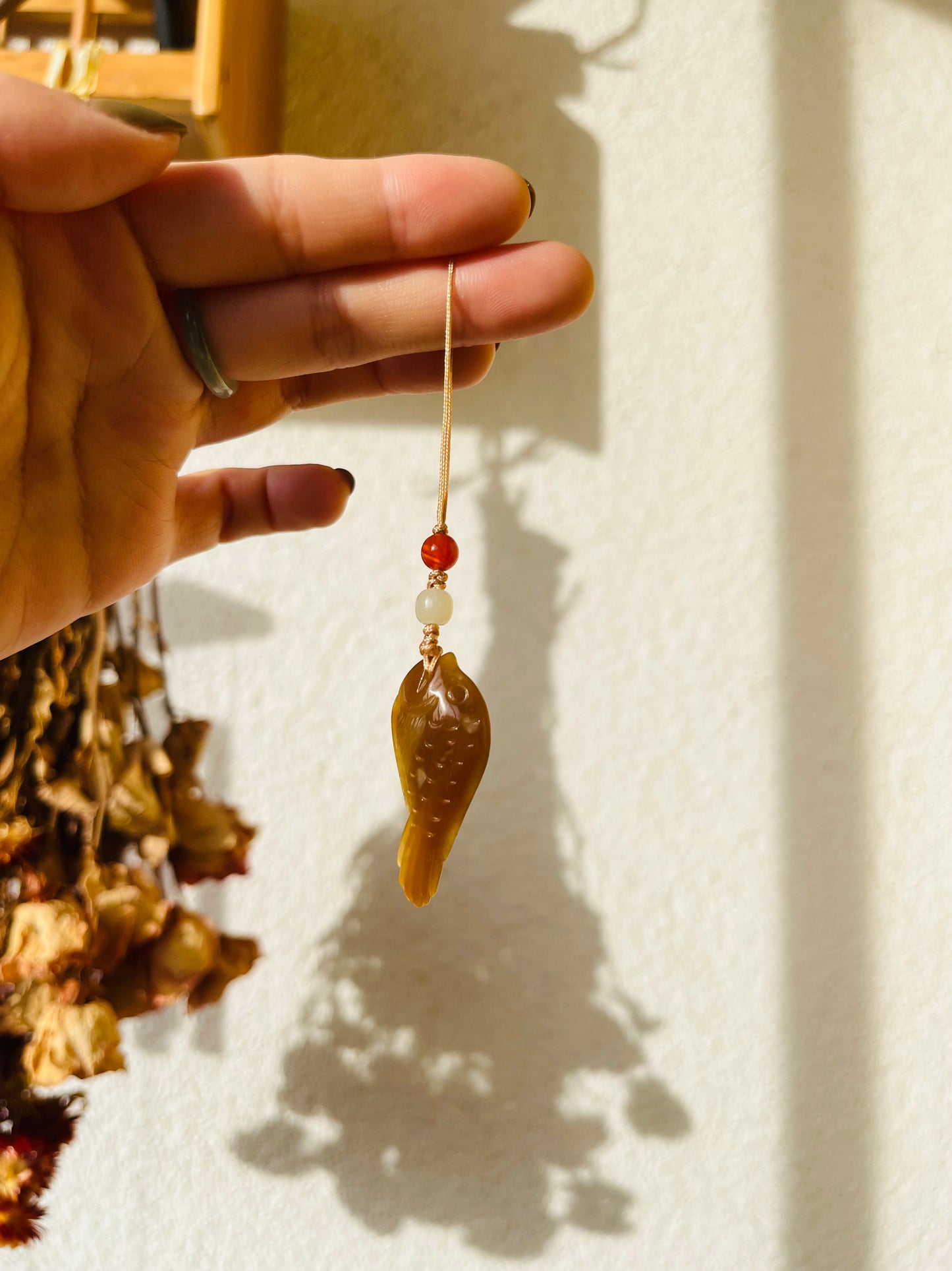 Hand Carved Brown Hetian Jade Fish Phone Charm
