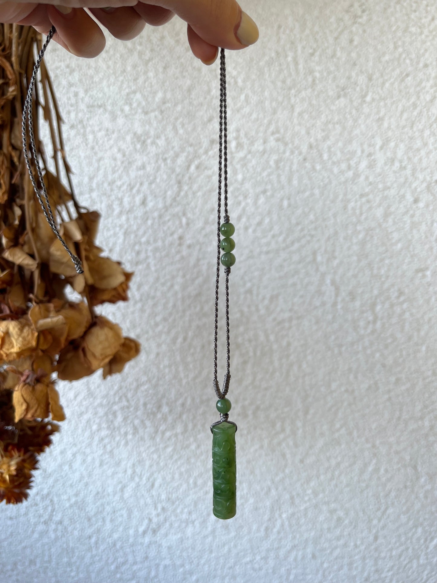 Cylindrical Green Hetian Jade Pendant Carved with Antique Pattern