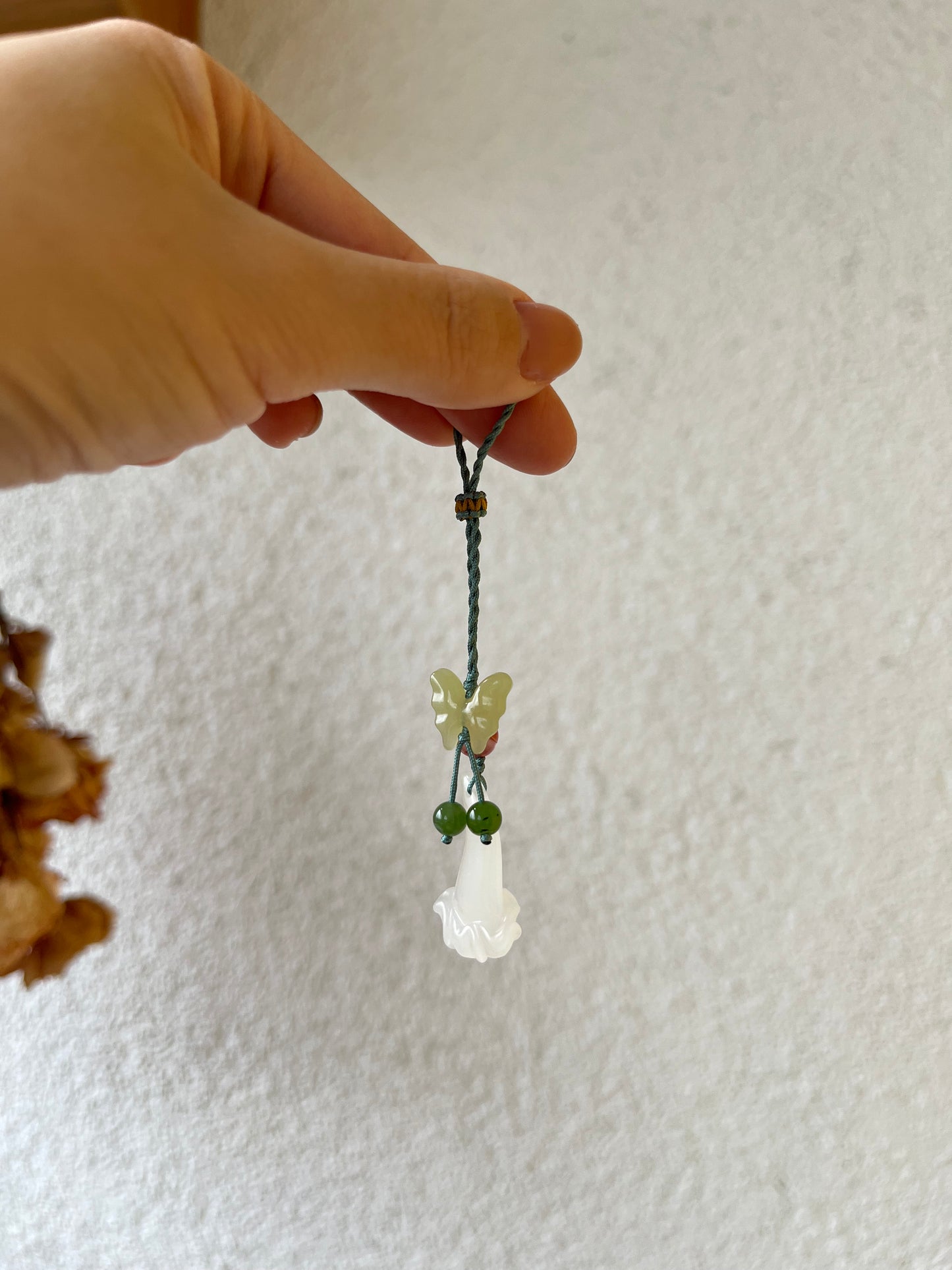 Handmade Phone Charm with a Hand Carved Hetian Jade Trumpet Flower and Butterfly