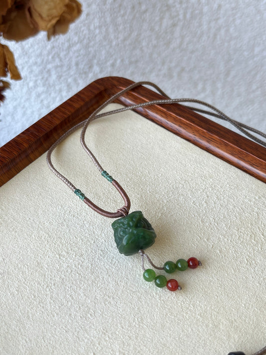 Carved Green Hetian Jade Chinese Lion Dance Head Pendant