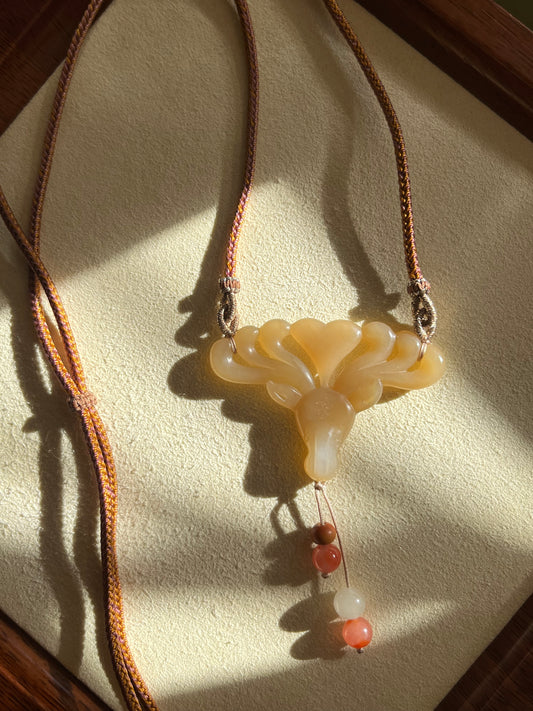 Hand Carved Brown And White Hetian Jade Deer Pendant | 手雕和田糖白梅花鹿