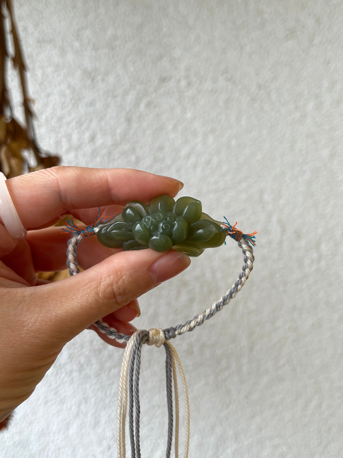 Handmade Bracelet with a Hand Carved Green Hetian Jade Lotus Pendant
