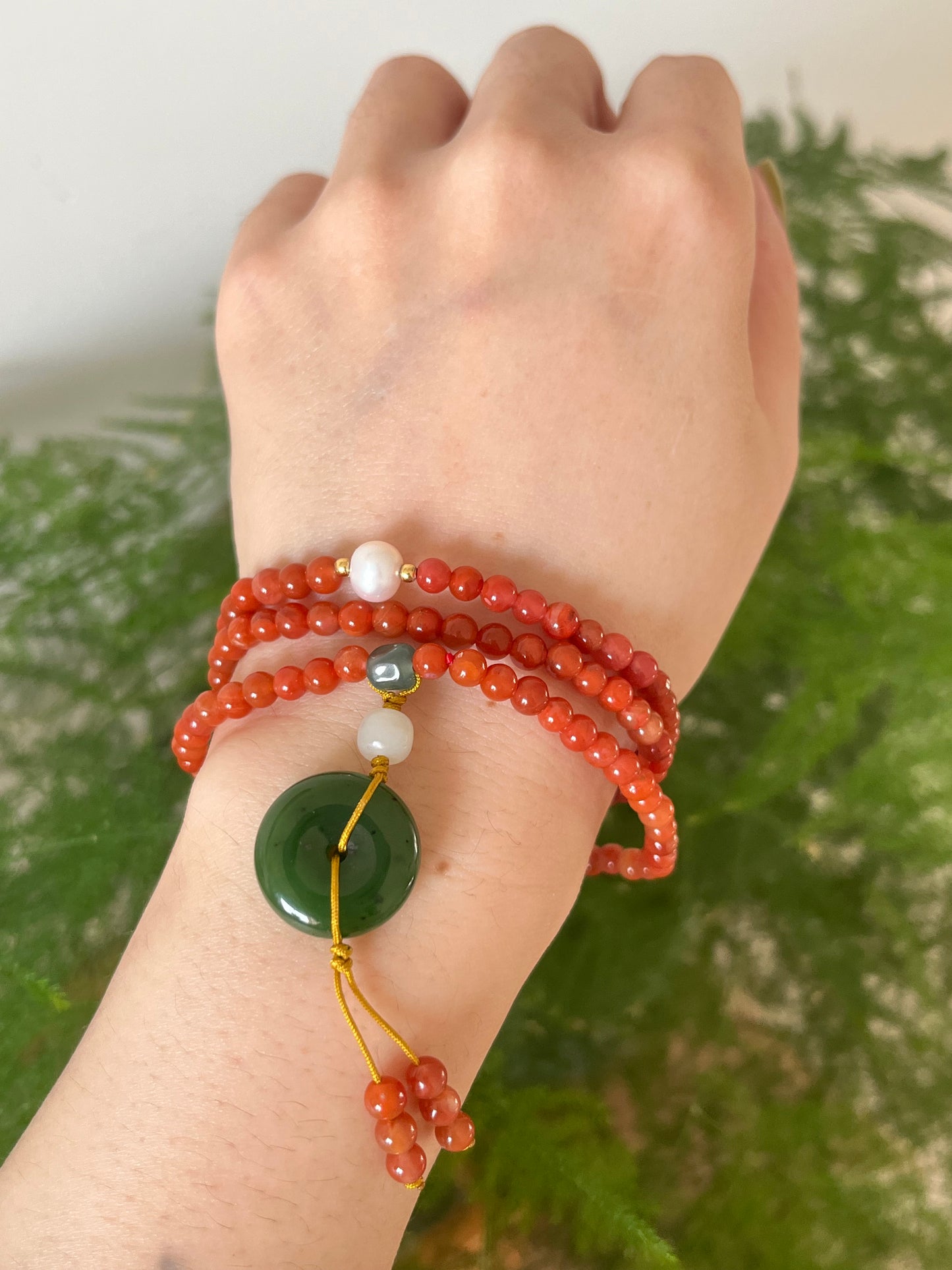 Multi-Function Three Loop Southern Red Agate Beaded Bracelet with a Green Hetian Jade PI pendant (ping an kou), 南红多圈手串加碧玉平安扣