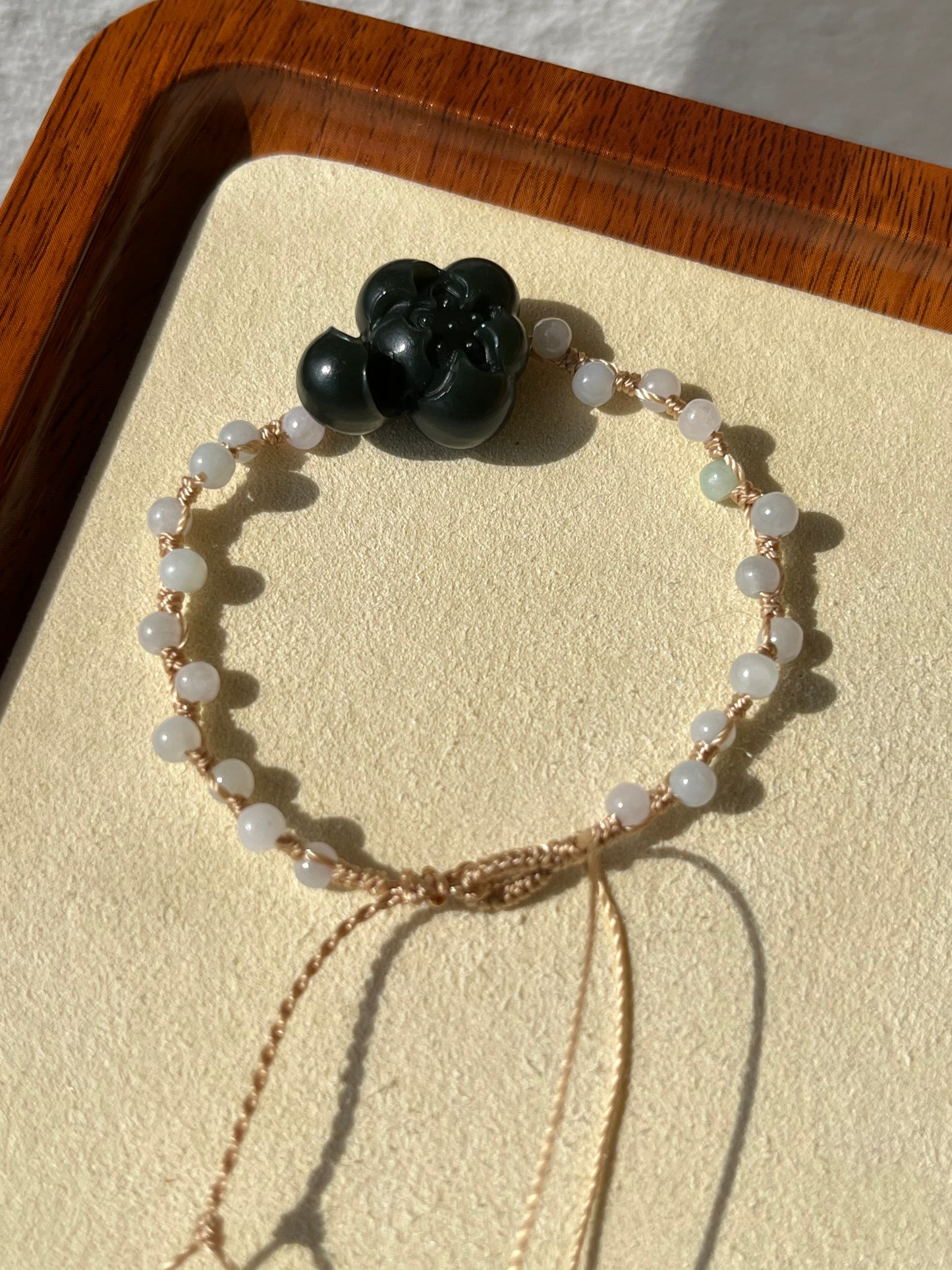 Handmade Bracelet with a Dark Cyan Hetian Jade Lotus | 手编和田青玉一细小荷花手牌