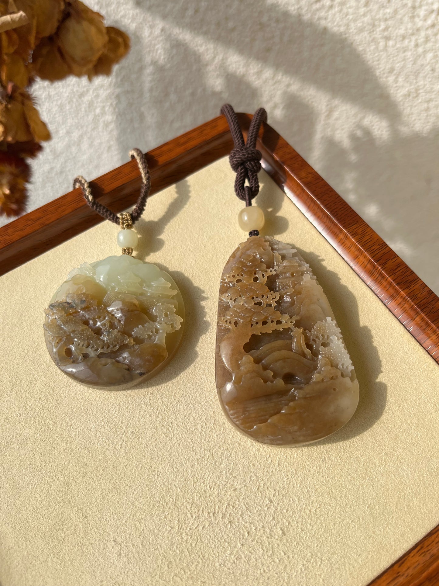 Hand Carved Brown and White Hetian Jade Landscape Pendant | 手雕糖白和田玉山水手把件