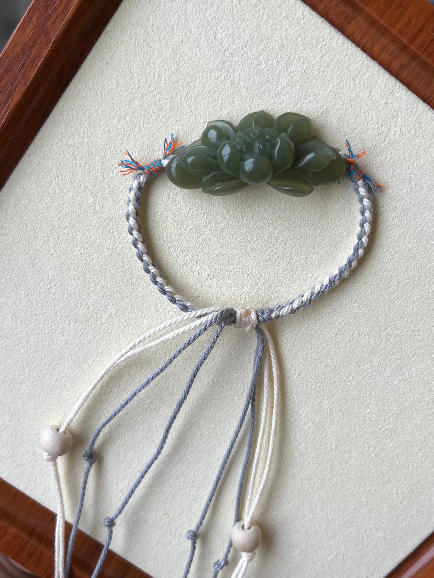 Handmade Bracelet with a Hand Carved Green Hetian Jade Lotus Pendant