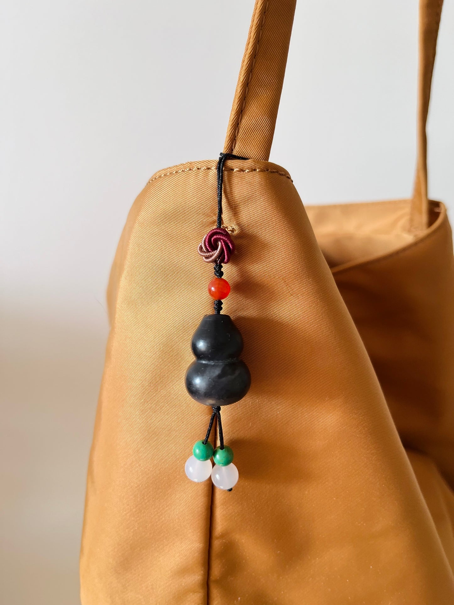 Handmade Phone Charm / Bag Charm with a Carved Black Hetian Jade Hulu