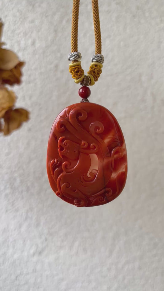 Hand Carved Nanhong Agate Chi Dragon Pendant