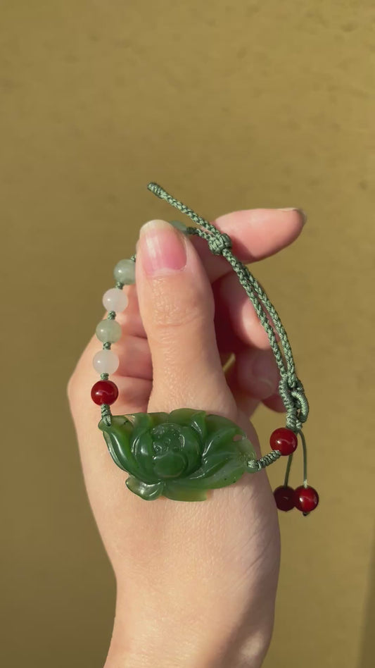 Handwoven Bracelet with a Hand Carved Green Hetian Jade Lotus Flower, ęē¼åē°ē¢§ēč²č±ęē